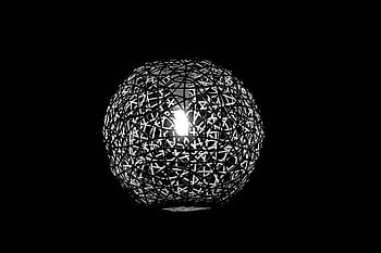geometric sphere, black background, abstract art, modern design, light pattern, 3D rendering, spherical object, geometric design, minimalist art, black and white, abstract sphere