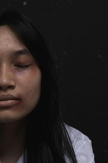 woman crying, close-up portrait, shedding a tear, deep emotion, sadness, emotional expression, facial close-up, black background, sad woman, emotional tears, portrait photography