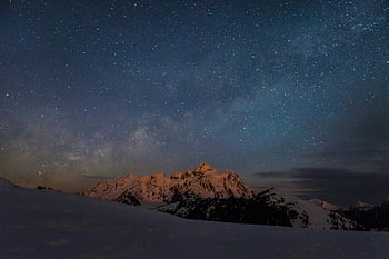 night sky, snowy mountain peaks, starry sky, mountain landscape, winter scenery, Milky Way, night photography, mountain view, star-filled sky, alpine landscape, snow-covered mountains
