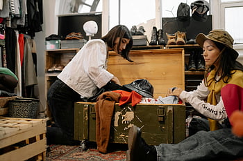 women, vintage clothing, thrift shop, wooden box, sorting clothes, shoes, hats, shopping, fashion, second-hand, shopping experience
