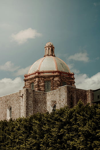 Dome of the Church of San Francisco, San Miguel de Allende, historic church, majestic dome, clear sky, Mexico, architectural landmark, religious building, cultural heritage, travel destination, tourism site
