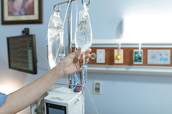 IV drip, Dextrose, medical care, hospital room, close-up image, hand, medical equipment, healthcare, intravenous therapy, patient care, healthcare setting