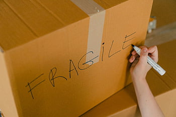 fragile, packing, box, cardboard, hand, writing, marker, careful handling, close-up, items, crop person