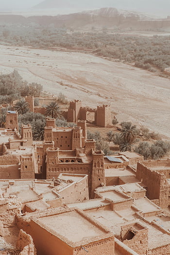 Ait Ben Haddou, kasbah, Morocco, aerial shot, traditional architecture, Moroccan desert, landscape, ancient buildings, historic site, UNESCO World Heritage, desert oasis