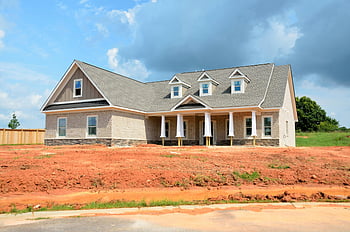 Gray Bungalow, Brick home, modern family home, new construction, architectural style, blue sky, white clouds, bright sky, family house, residential property, suburban home