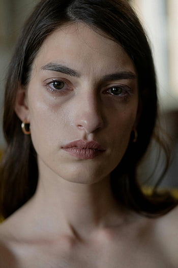 crying woman, close-up portrait, emotional tears, sad expression, evoking emotion, woman's face, close-up shot, emotional portrait, human emotion, facial expression, sadness