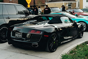 Black Audi R8, car show, luxury cars, spectators, Texas license plate, black car, parked street, convertible sports car, high-performance vehicle, car enthusiasts, automotive event