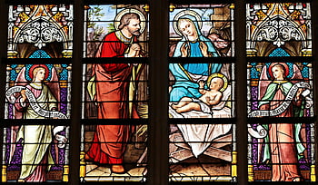 stained glass, Holy Family, biblical nativity, church window, vibrant colors, religious art, Mary and Joseph, baby Jesus, angel figures, church setting, nativity scene