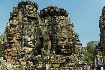 chrámu bayon, kamenné tváře, starověká kambodžská architektura, složité řezby, angkor wat, historické místo, kamenná socha, zříceniny chrámu, kulturní dědictví, cestování kambodža, starověké civilizace