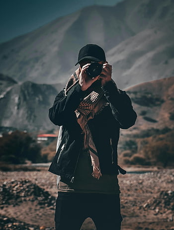 persoon met camera, fotograaf, bergachtig terrein, donkere kleding, nemen van foto's, dag, buitenfotografie, schilderachtig landschap, Avontuurfotografie, natuurfotograaf, reisfotografie