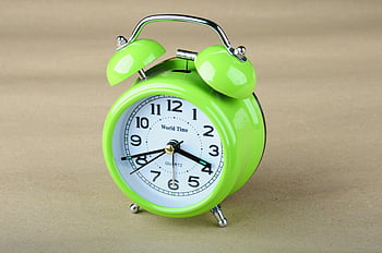 green alarm clock, lime green clock, retro alarm clock, vibrant green clock, close up clock, simple background, world time clock, quartz clock, analog clock, vintage clock, clock time display
