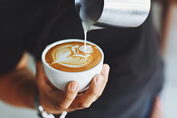 coffee art, latte art, barista, pouring milk, coffee cup, close-up, coffee making, barista skills, milk pouring, coffee design, latte design