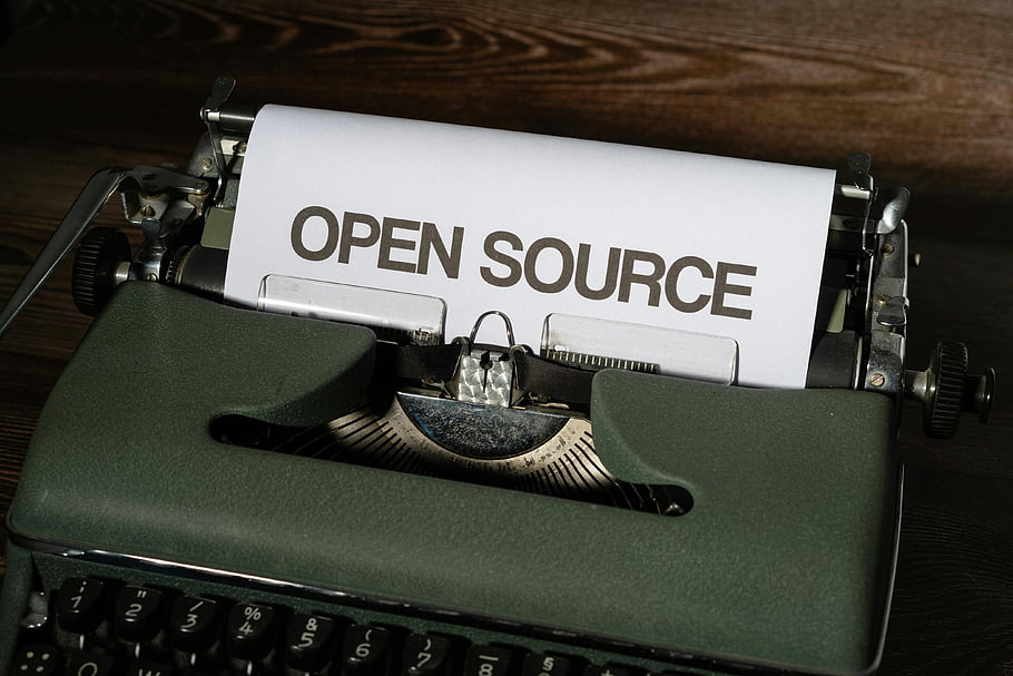 typewriter, vintage typewriter, close-up shot, open source, text on paper, retro typewriter, writing machine, old typewriter, mechanical typewriter, close-up photography, vintage writing