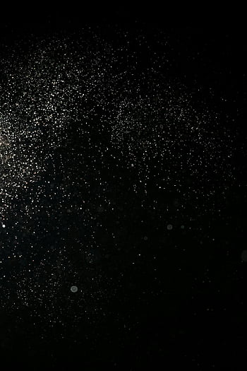 小さな白い塵の粒子、 黒の背景、 抽象的なイメージ、 きらめく粒子、 星空、 グリッター効果、 宇宙の背景、 マイクロ粒子、 暗い背景、 ピンぼけ効果、 スペーステーマ