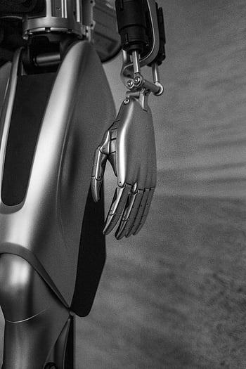 futuristic AI robot, metal arm, black and white, robotic arm, advanced AI technology, close-up, sleek design, artificial intelligence, technology, robotics, future tech