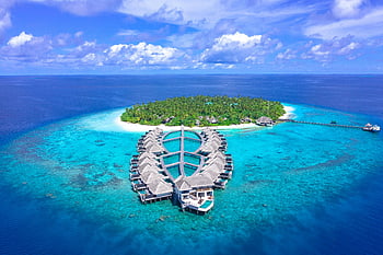 letecký pohled, Outrigger Island Resort, Konotta, Maledivy, tropický ostrov, tyrkysové vody, letovisko, Maledivy cestování, luxusní resort, Bungalovy nad vodou, pláž dovolená