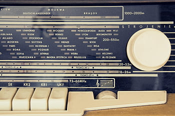 vintage radio, tuning dial, city stations, black and white, detailed view, retro radio, radio dial, station names, classic radio, old radio, radio buttons