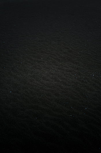 abstract dark texture, subtle waves, specks of light, dark surface, abstract image, wave patterns, textured surface, abstract background, dark abstract, subtle texture, speckled light