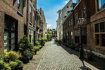 leiden, Nizozemí, dlážděné ulice, Klasická nizozemská architektura, Černá outdoor post lucerna, malebné ulici, Holandské budovy, pouliční lucerny, historické architektury, Evropské ulice, venkovní lucernou
