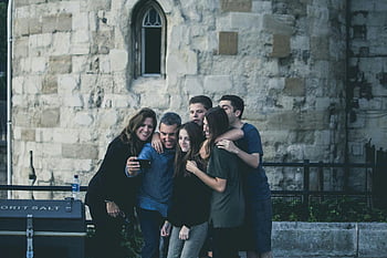 friends, selfie, outdoor, group, enjoying, moment, together, stone wall, casual, fun, gathering