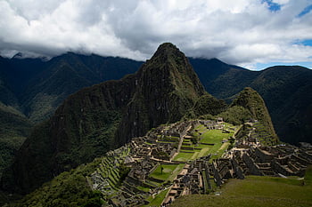 Machu Picchu, Peru, ancient Incan citadel, lush Andean mountains, stunning view, Machu Picchu ruins, Incan architecture, Andes landscape, historical site, travel destination, South America