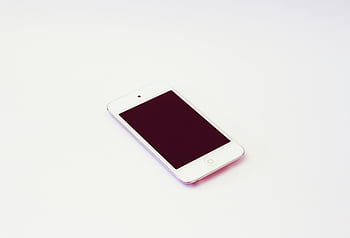 white iPod Touch, minimalist design, electronic device, plain surface, white background, touch screen, modern technology, compact gadget, sleek design, portable media player, digital device