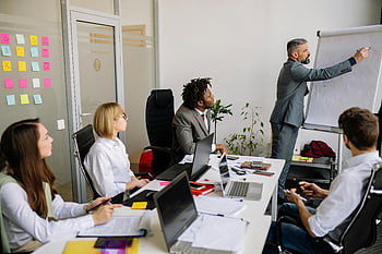 pracovní schůzka, Kolaborativní setkání, setkání týmu, Prezentace flip grafu, Kancelářské prostředí, Profesionální nastavení, Skupinová diskuse, obchodní tým, zasedací místnost, prezentace, Prezentace vůdce