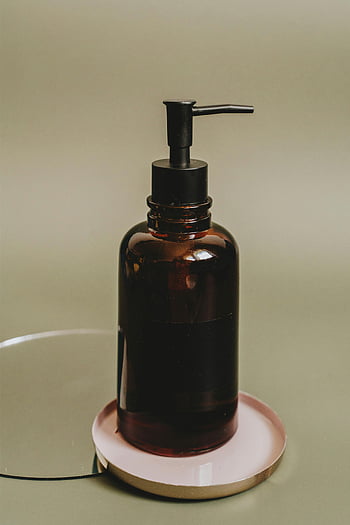 bärnstensfärgad pumpflaska, flytande tvål, lotion, hudvårdsrutiner, gult flaska, Pumpdispenser, badrumstillbehör, hudvårdsprodukter, gult glasflaska, Pumpflaska, flytande dispenser