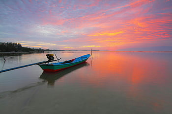 boat on water, serene scene, calm waters, breathtaking sunset, vibrant colors, sunset reflection, peaceful landscape, water reflection, colorful sky, tranquil setting, fishing boat