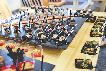 lunch table, gourmet finger foods, colorful assorted, beautifully displayed, event table, appetizers, finger food, event catering, food presentation, party food, table setup