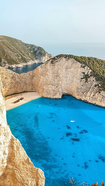 batık sahil, Zakynthos Island, turkuaz suları, yükselen kayalıklar, nefes kesici manzara, Mavi Deniz, gemi enkazı, Yunanistan, kıyı manzarası, doğal güzellik, seyahat hedefi