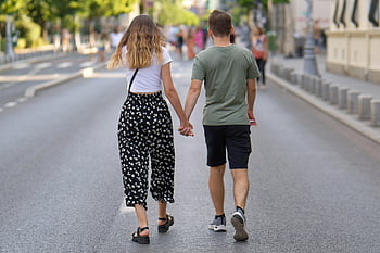couple-walking-street-people-promenade-nature-young-girl-boy-casual-thumbnail.jpg