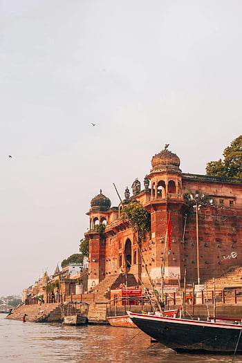 Chet Singh Ghat, uttar pradesh, indien, ganges flod, Varanasi, Historisk ghat, naturskøn udsigt, Riverbank Arkitektur, traditionelle både, kulturarv, gamle strukturer