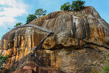 Sigiriya Rock Fortress, UNESCO World Heritage site, Sri Lanka, stairs, tourists ascending, breathtaking view, rock mountain, climbing stairs, ancient fortress, travel destination, cultural landmark