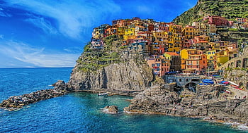 Manarola, colorful houses, cliffs, blue sea, panoramic view, blue sky, Cinque Terre, coastal town, vivid view, seaside village, Italy