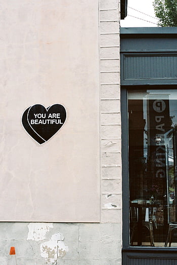 heart-shaped sign, You Are Beautiful, urban wall, black and white, street art, motivational message, public art, wall art, heart sign, urban decor, street decor