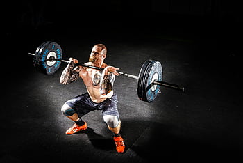 muž zvedání činka, Power Clean Cvičení, svalnatý muž, Disly osvětlená tělocvična, vzpírání, zdatnost, posilovna cvičení, BUBELL WORKOUT, silový trénink, Atletický muž