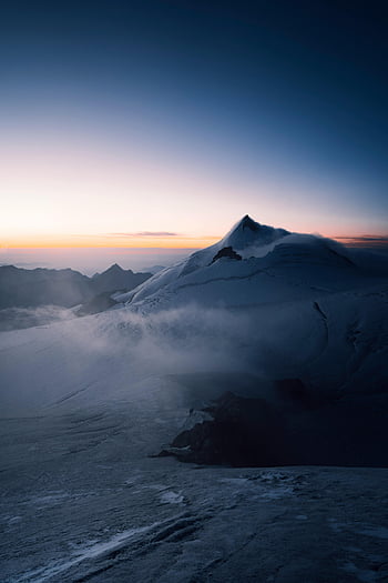snowcapped mountain, winter landscape, sunrise, Zermatt, Switzerland, mountain peak, foggy mountains, breathtaking view, snow-covered peaks, alpine scenery, mountain mist