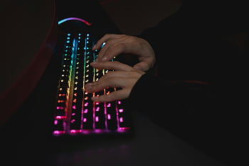close-up, hands typing, RGB backlit, mechanical keyboard, dimly lit, environment, colorful keyboard, typing hands, keyboard close-up, backlit keyboard, mechanical