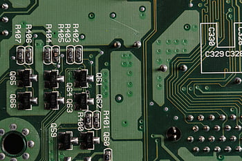close-up shot, chip, electronic circuit board, visible components, traces, detailed view, circuitry, microelectronics, semiconductor, technology, electronics