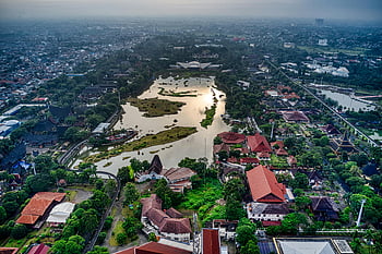 aerial view, Cipayung, Jakarta, body of water, colorful rooftops, scenic landscape, urban scenery, cityscape, residential area, greenery, water reflection