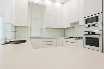 modern kitchen, white cupboards, minimalist design, built-in appliances, sleek kitchen, contemporary kitchen, white cabinets, kitchen design, modern appliances, clean kitchen, white kitchen