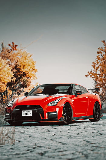 นิสสันสีแดง gt-r, ทางเท้าสีเทา, รถสปอร์ตสีแดงสดใส, ต้นไม้ในฤดูใบไม้ร่วง, ที่จอดรถ, ถนน, รถสปอร์ต, นิสสัน gt-r, ฤดูใบไม้ร่วง, รถถ่ายภาพ, รถสีแดง