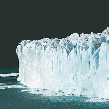 Arctic ocean, floating iceberg, large iceberg, intricate ice formations, ocean scenery, serene view, ice formations, Arctic ice, ocean ice, stunning view, icebergs