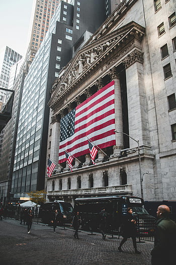 American Flag, New York Stock Exchange, bustling street life, large American flags, financial district, urban scene, historic building, cityscape, Wall Street, American symbols, financial market