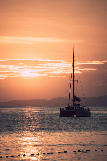 sailboat silhouette, sunset, Ao Nang, Thailand, serene waters, cruising, stunning, sea, sky, horizon, catamaran