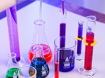 laboratory glassware, colorful chemicals, scientific research, vivid liquids, beakers, test tubes, flasks, lab equipment, chemical analysis, science lab, laboratory tools