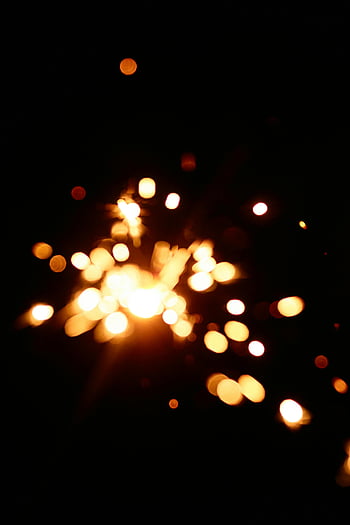 abstract bokeh, sparkling lights, black background, shimmering effects, glistening lights, dazzling visual, bokeh lights, night lights, light effects, abstract art, bokeh photography