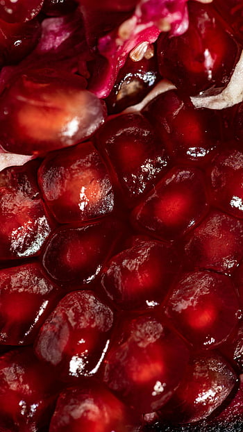 macro shot, red pomegranate seeds, ripe pomegranate, juicy seeds, vibrant color, texture, close-up, detailed image, fruit photography, food photography, pomegranate arils