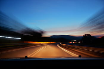 asphalt road, timelapse photography, blurred highway, car lights, twilight scene, motion effect, speed capture, evening drive, long exposure, road photography, twilight road